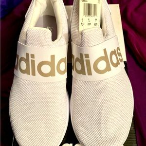 White Adidas tennis shoes